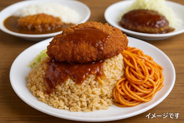 arge plate of food served on a wooden table, featuring fried pork cutlet over rice, spaghetti, and background dishes of curry and hamburger steak with cabbage